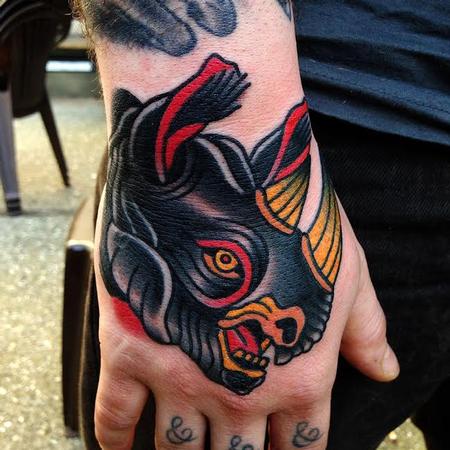 Black rhino hand tattoo