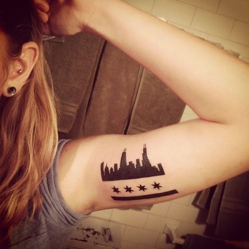 Black stars and town tattoo