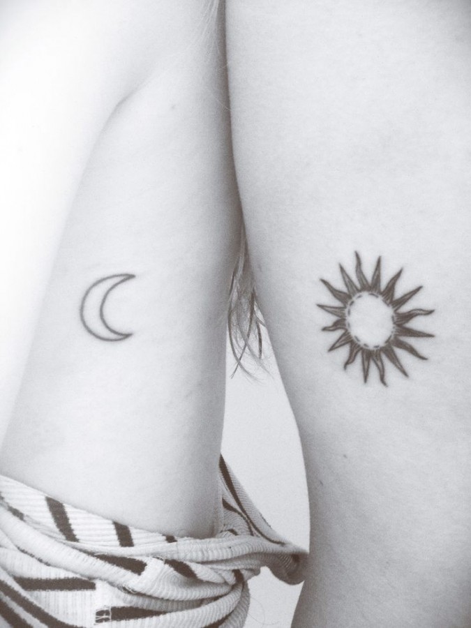 Black sun family love tattoo
