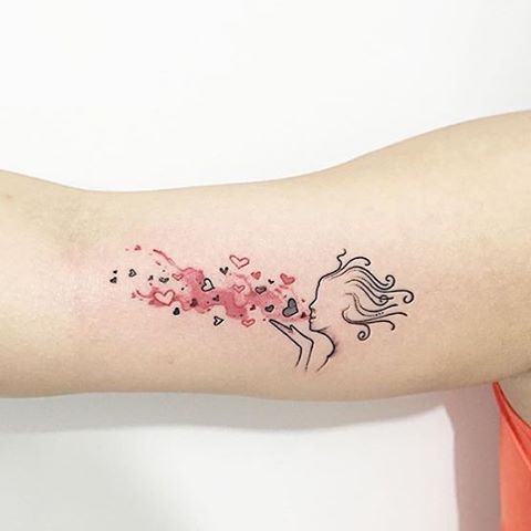 blowing kisses tattoo by hugoperestattoo