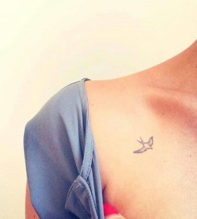 Blue bird's tiny tattoo