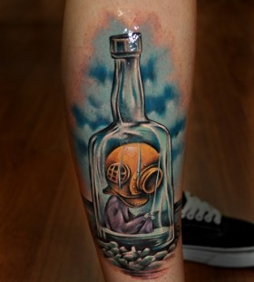 Blue cool looking bottle tattoo