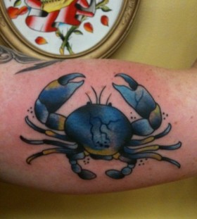 Blue crab arm tattoo