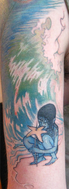 Blue girl with starfish tattoo