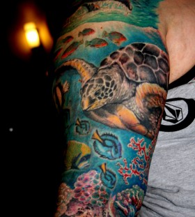 Blue ocean and turtle tattoo