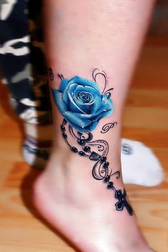 Blue rose ankle tattoo