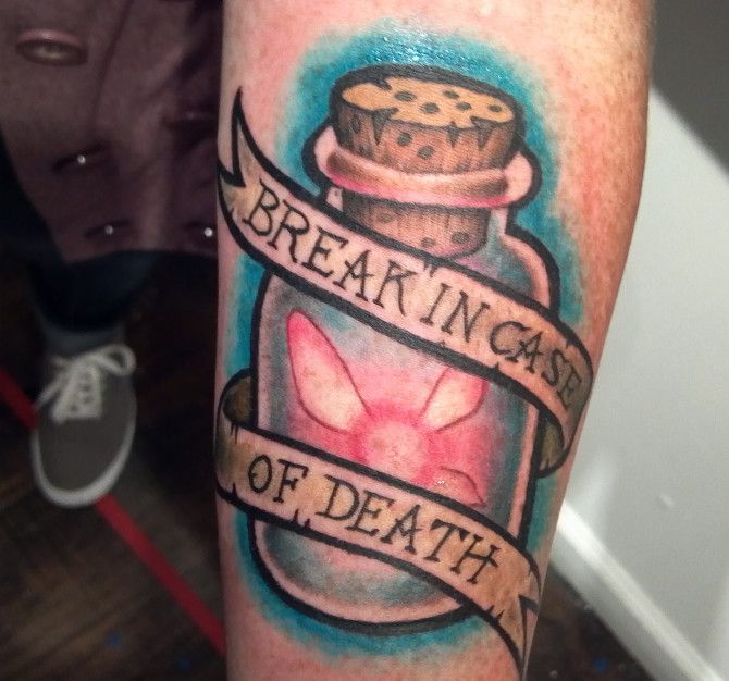 Bottle and quote tattoo