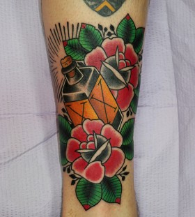 Bottle of poison and roses tattoo