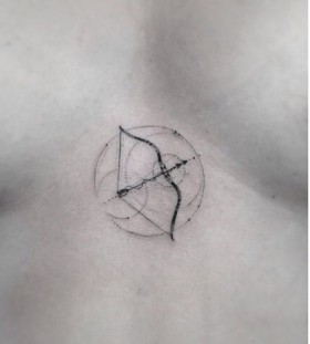 Bow and arrow chest tattoo by Dr Woo
