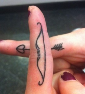 Bow and arrow finger tattoos