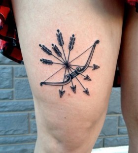 Bow and arrow leg tattoo
