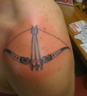 Bow and arrow shoulder tattoo