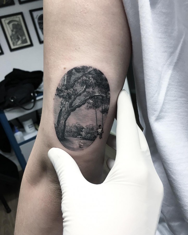 boy-on-tree-swing-circle-tattoo
