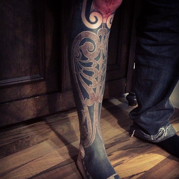 Brilliant leg tattoo by Gerhard Wiesbeck