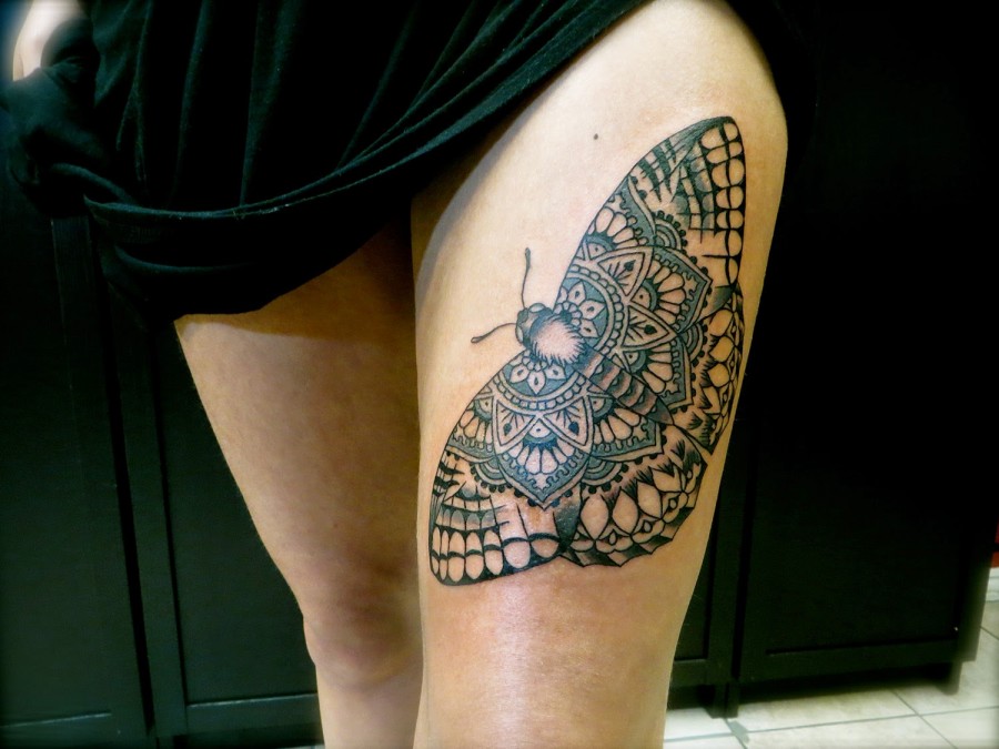 Brilliant moth leg tattoo