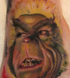 Brown awesome grinch christmas tattoo