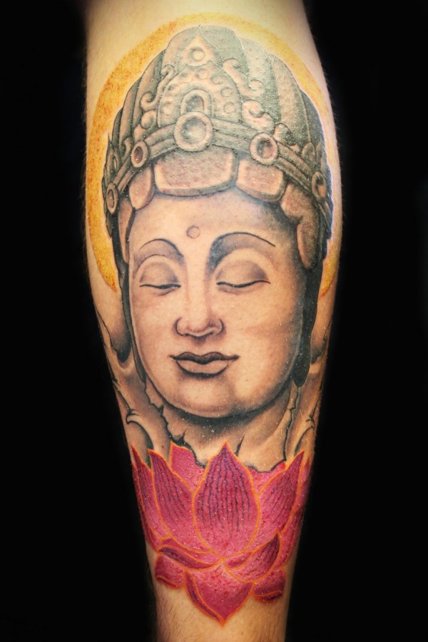 Buddha and lotus flower leg tattoo