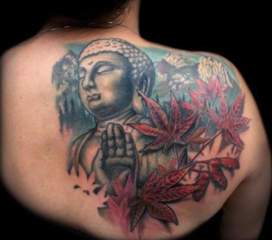 Buddha and maple leaves tattoo