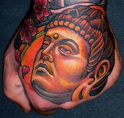 Buddha hand tattoo by Lars Uwe Jensen