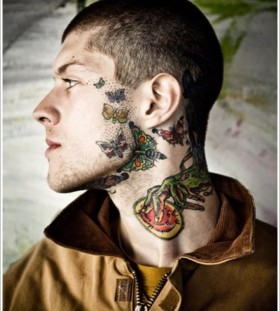 Buterfly face tattoo