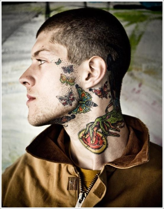 Buterfly face tattoo
