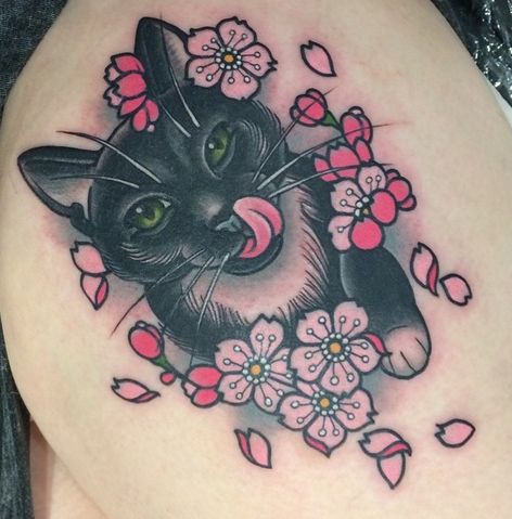 Cat and flowers tattoo by Clare Hampshire