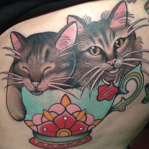 Cats in a teacup tattoo by Clare Hampshire