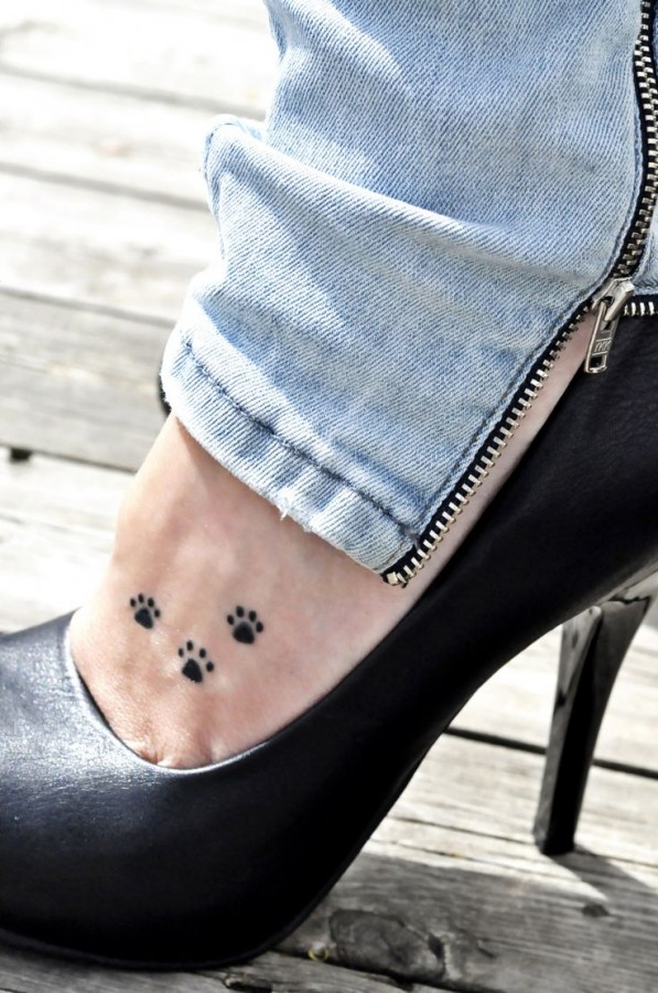 Cats’s paw tiny tattoo