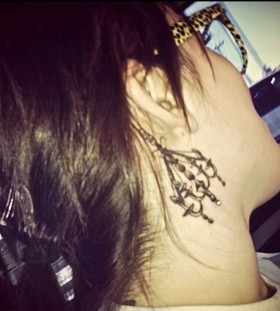 Chandelier behind ear tattoo