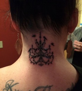 Chandelier tattoo on back of neck