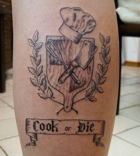 Chief of kitchen style black tattoo