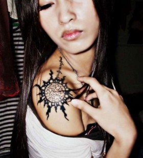 Chinese girl sun clock tattoo