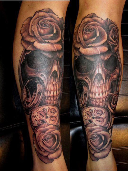 Clock and skull and rose tattoo
