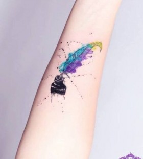 Colorful feather and black bottle tattoo