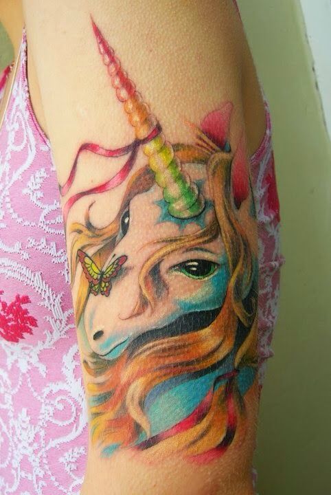 Colorful lovely unicorn tattoo