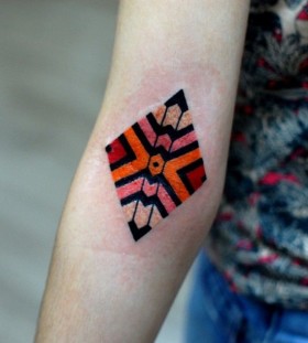 Coloured arm tattoo by Brian Gomes