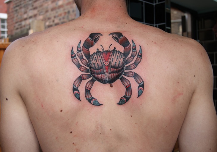 Coloured crab back tattoo