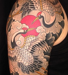 Coloured crane shoulder tattoo