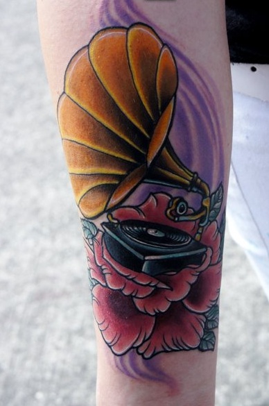 Coloured gramophone arm tattoo