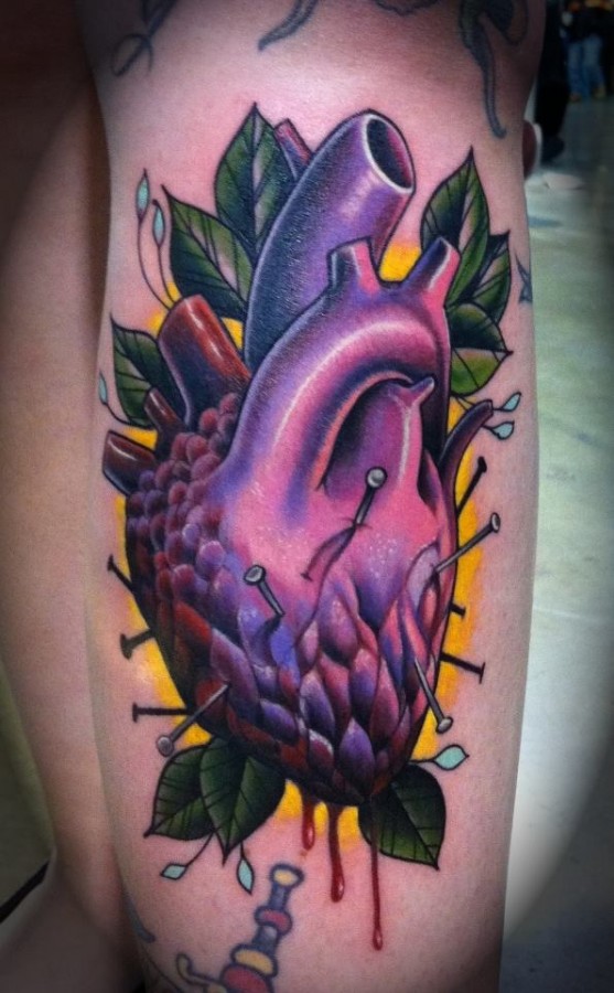 Coloured heart tattoo by Jon Mesa