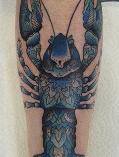 Coloured lobster leg tattoo