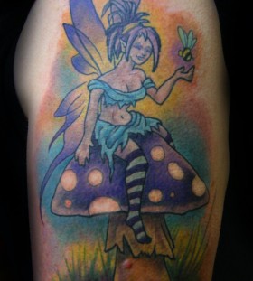 Coloured mushroom fairy tattoo
