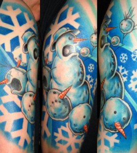 Coloured snowman arm tattoo