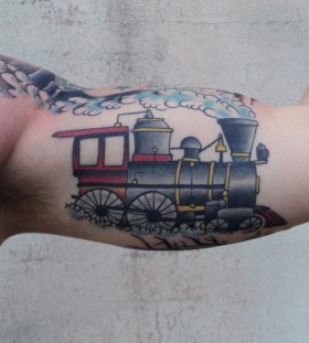 Coloured train arm tattoo