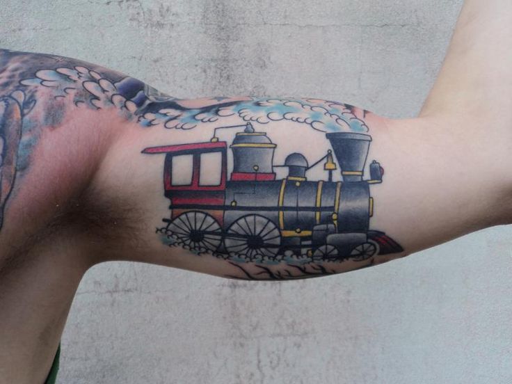 Coloured train arm tattoo