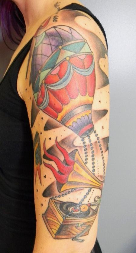 Colourful air balloon arm tattoo