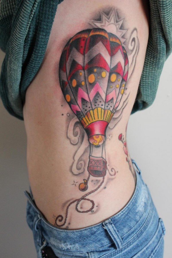 Colourful air balloon side tattoo