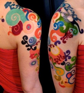 Colourful arm tattoo by Esther Garcia