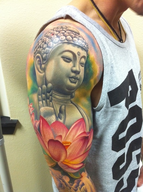 Colourful buddha and lotus flower tattoo