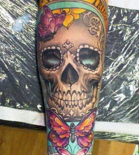 Colourful butterflies and skull tattoo by Ellen Westholm